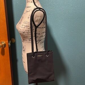 Nine West black canvas shoulder bag w/cheetah spots on inside material